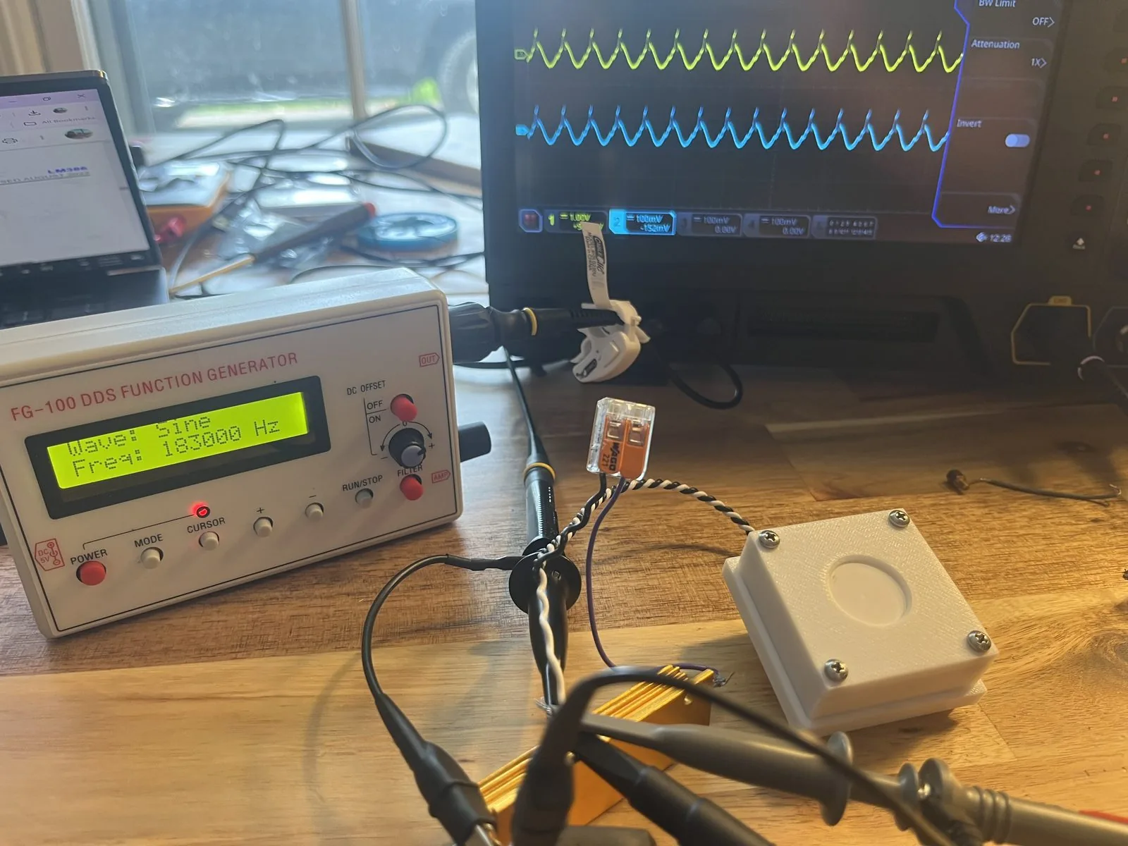 Oscilloscope and probes on the Kyros bench during board bring-up